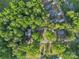 Aerial view showcasing the home's location among lush greenery and surrounding neighborhood at 1420 Columbus St, Albemarle, NC 28001