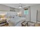 Cozy bedroom with natural light, a comfortable bed, and rustic decor accents at 1420 Columbus St, Albemarle, NC 28001