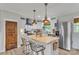 Bright kitchen with a butcher block island, stainless steel appliances, and pendant lighting at 1420 Columbus St, Albemarle, NC 28001