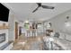 Open-concept living room seamlessly connecting to the kitchen with hardwood floors at 1420 Columbus St, Albemarle, NC 28001