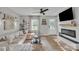 Comfortable living room with a modern fireplace, a large window, and stylish decor at 1420 Columbus St, Albemarle, NC 28001