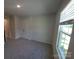 Bedroom with carpet and a window, next to a double door closet at 2009 Vinyasa Ln # Sts-44, Charlotte, NC 28215