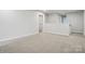 Bright bonus room featuring plush carpeting and ample natural light at 2009 Vinyasa Ln # Sts-44, Charlotte, NC 28215
