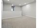 Expansive bonus room offering neutral carpet and versatile space at 2009 Vinyasa Ln # Sts-44, Charlotte, NC 28215