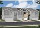 Row of newly constructed townhomes featuring neutral siding, individual garages, and well-manicured lawns at 2009 Vinyasa Ln # Sts-44, Charlotte, NC 28215