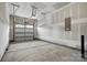 Spacious two-car garage featuring an automatic door and ample room for storage at 2009 Vinyasa Ln # Sts-44, Charlotte, NC 28215