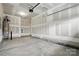 An unfinished two-car garage offers a blank canvas for custom design and storage solutions at 2009 Vinyasa Ln # Sts-44, Charlotte, NC 28215