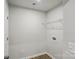 Laundry room with neutral walls, a utility sink and wood-look flooring at 2009 Vinyasa Ln # Sts-44, Charlotte, NC 28215