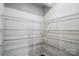 Walk-in pantry featuring ample shelving for organized storage at 2009 Vinyasa Ln # Sts-44, Charlotte, NC 28215