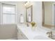 Bathroom featuring dual sink vanity, framed mirror and granite countertops at 20135 Northport Dr, Cornelius, NC 28031