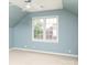 Bedroom featuring an oversized window and light blue walls at 20135 Northport Dr, Cornelius, NC 28031