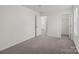 Cozy bedroom with neutral walls and plush carpet flooring, ready for personalization and relaxation at 2022 Mcdonald Dr, Stanfield, NC 28163
