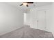 Bedroom with overhead fan and two doors at 2022 Mcdonald Dr, Stanfield, NC 28163