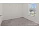 Bright bedroom with carpet floors and a window at 2022 Mcdonald Dr, Stanfield, NC 28163