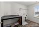Functional laundry room with countertop and storage space at 2022 Mcdonald Dr, Stanfield, NC 28163