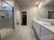 Modern bathroom with double vanity, a frameless glass shower, and contemporary finishes providing a spa-like experience at 21110 Bank Fire Ln, Huntersville, NC 28078