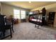 Bright bedroom features a large window and a dark wood bunk bed at 21110 Bank Fire Ln, Huntersville, NC 28078