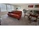 Bright and spacious bonus room with a seating area, desk, and abundant natural light at 21110 Bank Fire Ln, Huntersville, NC 28078