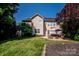 A spacious backyard offers an ideal place to relax and entertain at 219 Pleasant Grove Ln, Mooresville, NC 28115
