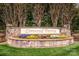 Stone entrance sign for Linwood Farms community, showcasing beautiful landscaping and mature trees at 219 Pleasant Grove Ln, Mooresville, NC 28115