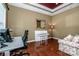 Versatile home office or living space with hardwood floors and ample natural light at 219 Pleasant Grove Ln, Mooresville, NC 28115