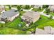 Beautiful aerial view showcasing a spacious backyard, manicured lawn, mature trees, and outdoor living area at 2655 Stonewood Vw, Kannapolis, NC 28081