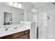 Bathroom featuring a vanity with modern fixtures and a glass shower enclosure at 2655 Stonewood Vw, Kannapolis, NC 28081