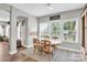 Bright dining area featuring natural light, a dining table and an accent wall at 2655 Stonewood Vw, Kannapolis, NC 28081