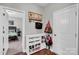 Hallway with a shoe storage bench and decorative wall hooks at 2655 Stonewood Vw, Kannapolis, NC 28081