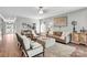 Cozy living room features comfortable seating, a ceiling fan, and a stylish rug at 2655 Stonewood Vw, Kannapolis, NC 28081