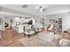 Open-concept living room features kitchen access and comfortable seating at 2655 Stonewood Vw, Kannapolis, NC 28081