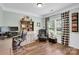 Inviting home office with built-in shelving, a comfortable leather chair, and natural light at 2655 Stonewood Vw, Kannapolis, NC 28081
