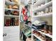 Well-organized walk-in closet with ample storage, featuring shelves and hanging space for clothes and accessories at 2655 Stonewood Vw, Kannapolis, NC 28081