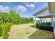 Lush backyard with covered patio and meticulously maintained lawn and landscaping at 3029 Trace Meadow Ct, York, SC 29745