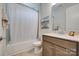 Bathroom with shower-tub combo, single sink vanity, and beach-themed art at 3029 Trace Meadow Ct, York, SC 29745