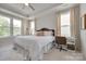 Well lit bedroom with a workstation, a king-sized bed, and bright windows at 3029 Trace Meadow Ct, York, SC 29745