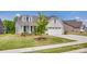 Well-maintained home with a landscaped front yard and a spacious two-car garage at 3029 Trace Meadow Ct, York, SC 29745