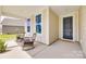 Inviting front porch with rocking chairs, perfect for relaxing and enjoying the neighborhood views at 3029 Trace Meadow Ct, York, SC 29745
