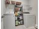 Laundry room with washer, dryer, shelving and supplies at 3029 Trace Meadow Ct, York, SC 29745