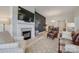 Comfortable living room with a fireplace, a decorative accent wall, and stylish furnishings at 3029 Trace Meadow Ct, York, SC 29745