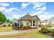 Community clubhouse with a well-manicured landscape and pool in the background on a partly cloudy day at 3033 Green Apple Dr, Dallas, NC 28034