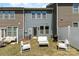 The backyard features a fence, patio seating, and a well-manicured lawn at 314 Embers Ln, Clover, SC 29710