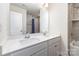 Clean bathroom featuring double sinks, granite countertop, and a shower-tub combo at 314 Embers Ln, Clover, SC 29710