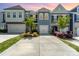 Charming townhome featuring a neatly manicured front yard and an attached garage in a desirable neighborhood at 314 Embers Ln, Clover, SC 29710