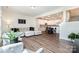 Open-concept living room seamlessly connects to a modern kitchen and dining area, perfect for entertaining at 314 Embers Ln, Clover, SC 29710