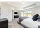 Spacious main bedroom with a trey ceiling, large windows, and carpeted floors at 314 Embers Ln, Clover, SC 29710