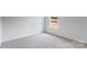 Cozy bedroom showcasing neutral carpet and a bright window for natural light at 3535 Cramer Creek Dr, Gastonia, NC 28056