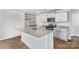 Well-designed kitchen with island, stainless steel appliances, and ample counter space at 3535 Cramer Creek Dr, Gastonia, NC 28056