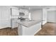 Stylish kitchen with an island, stainless steel appliances, and granite countertops at 3535 Cramer Creek Dr, Gastonia, NC 28056