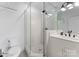 Bright bathroom featuring a glass walk-in shower and white vanity at 3933 Ayrshire Pl, Charlotte, NC 28210